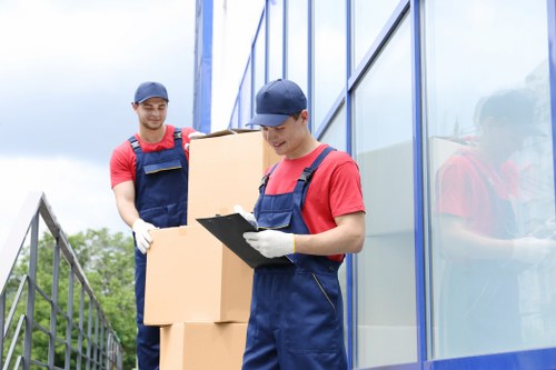 Person organizing boxes in a Boundsgreen storage setting